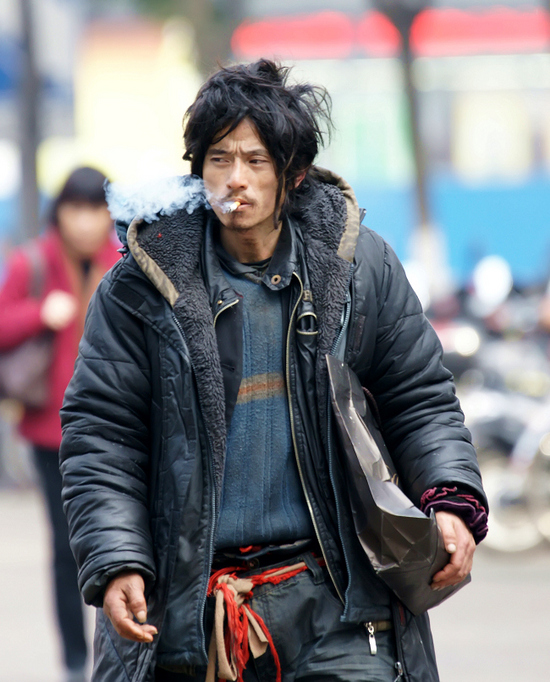 Brother Sharp, hailed by Chinese netizens as the most handsome beggar